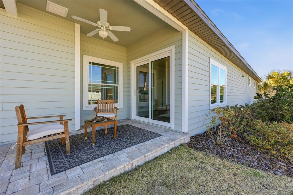 9567 Southwest 66th Lane Gainesville, FL 32608 - Photo 7 of 20 a view of a house with backyard and sitting area