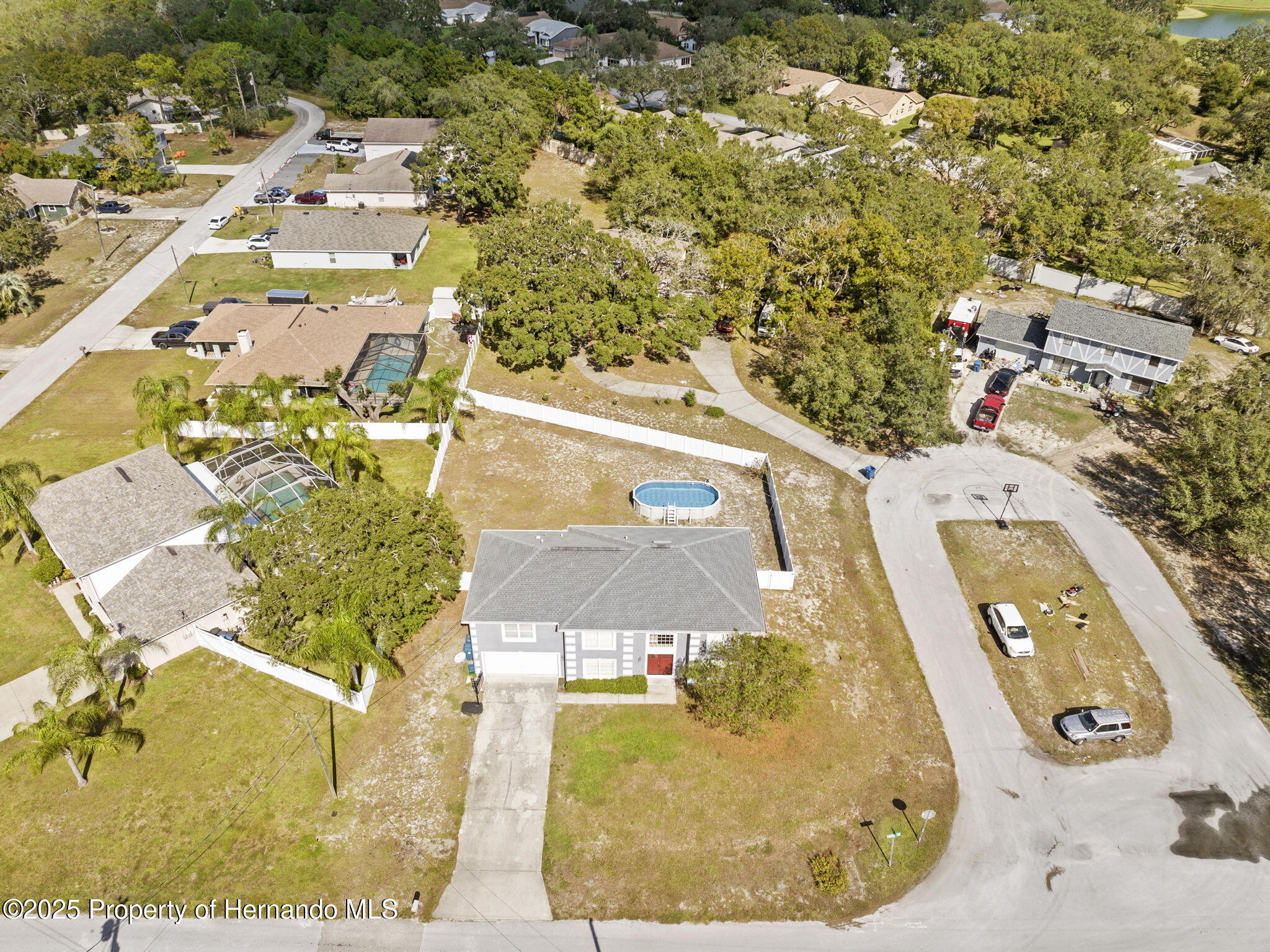 7319 Lagoon Road Spring Hill, FL 34606 - Photo 12 of 60 4-web-or-mls-DJI_20251015034626_0017_D