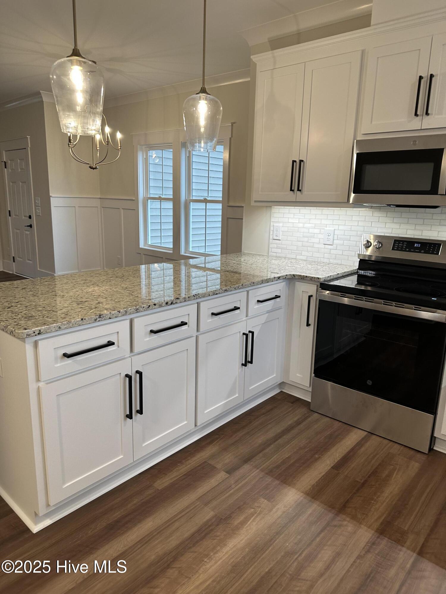 147 Conover Road La Grange, NC 28551 - Photo 12 of 34 Kitchen with electric range