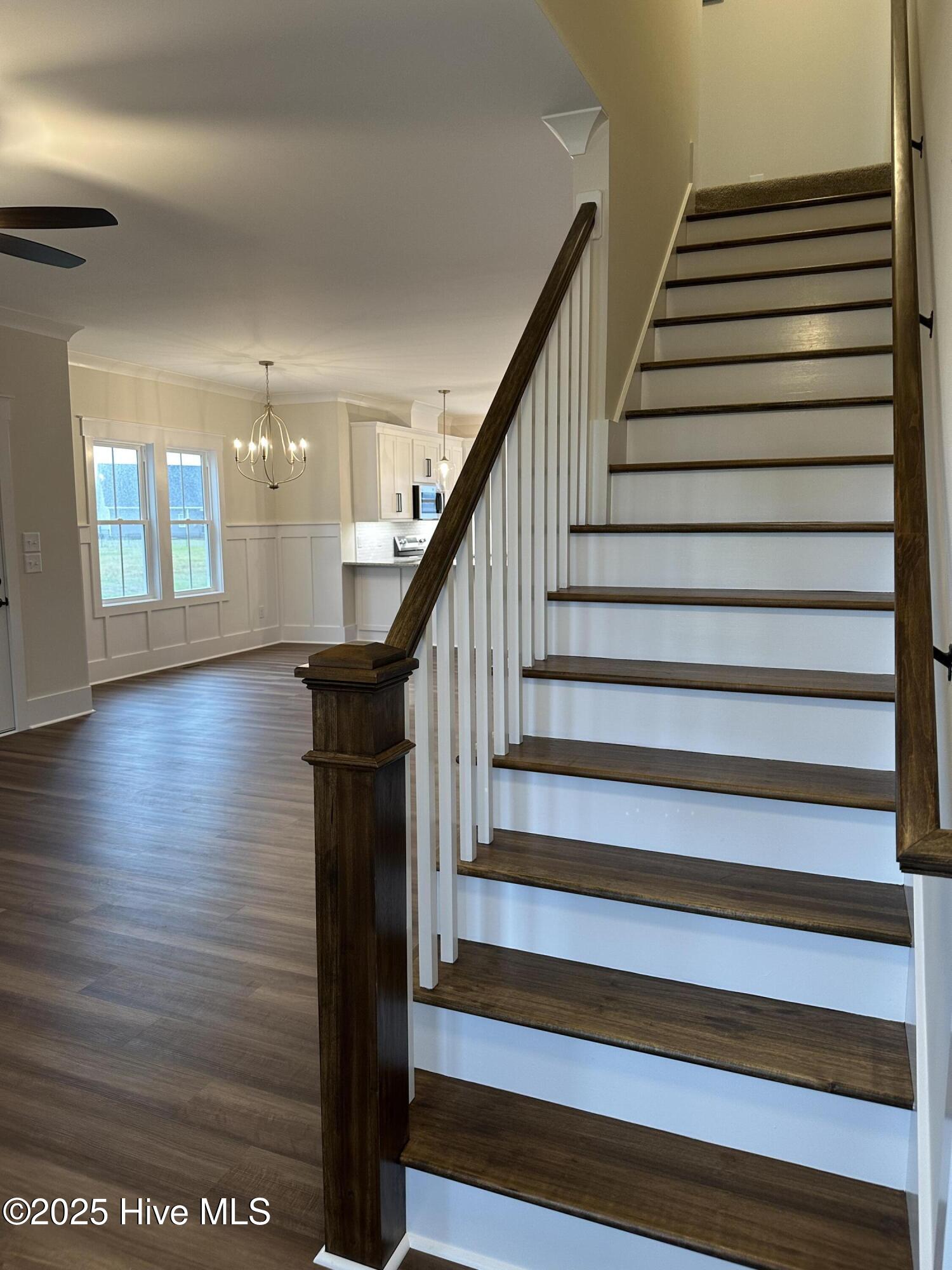 147 Conover Road La Grange, NC 28551 - Photo 6 of 34 Stairs with hardwood