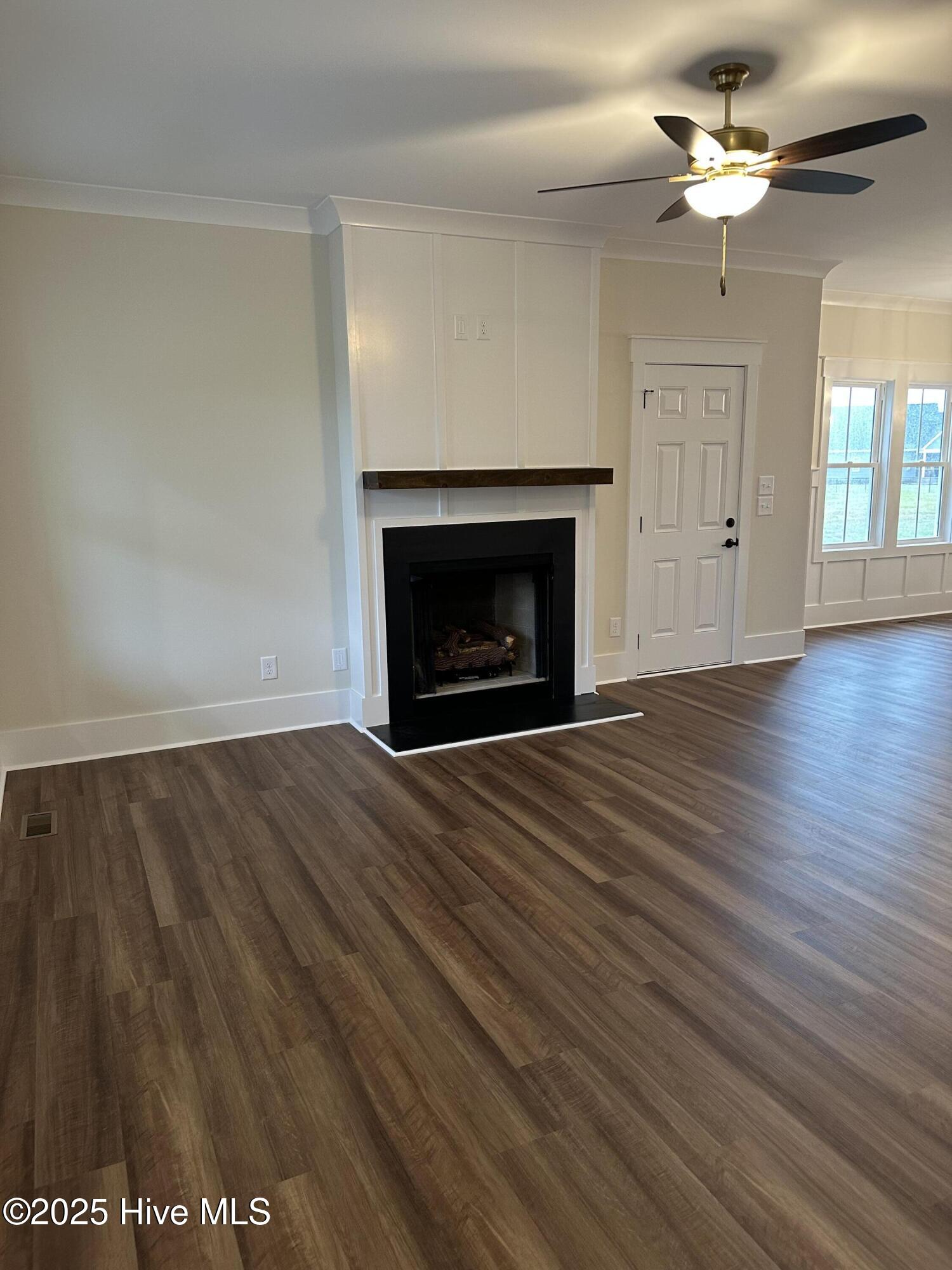 147 Conover Road La Grange, NC 28551 - Photo 7 of 34 LVP throughout first floor, gas fireplace