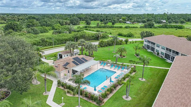 an aerial view of a house with a garden