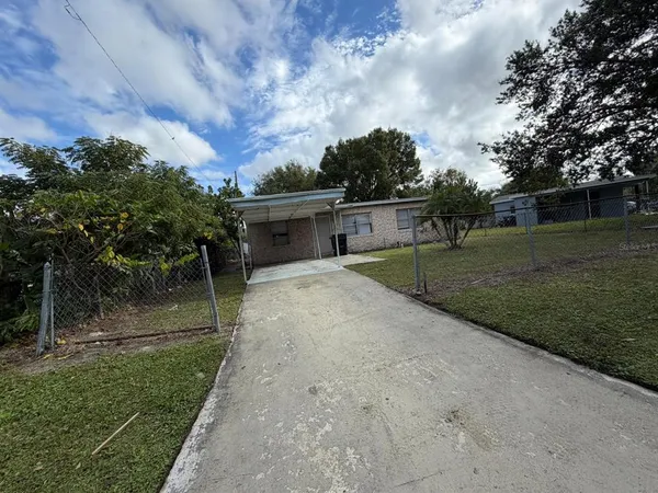 a view of backyard with green space