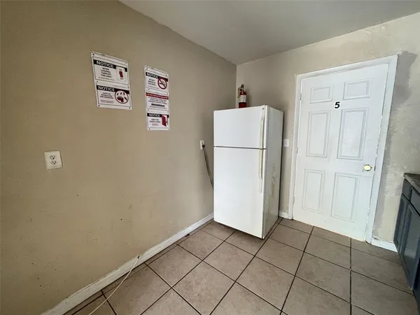 a view of a storage & utility room with washer and dryer