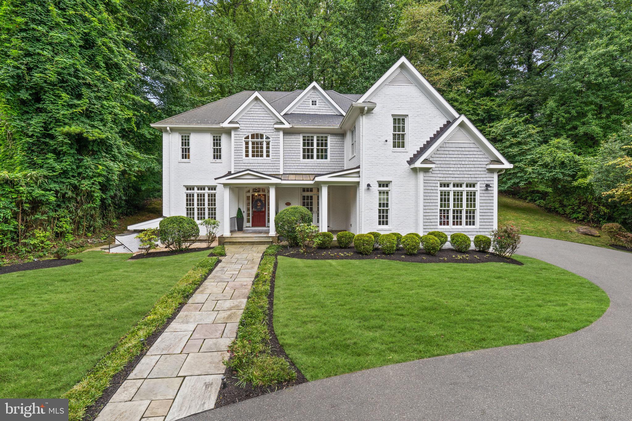 7500 Nevis Road Bethesda, MD 20817 - Photo 2 of 50 Expansive front yard with flagstone walkway