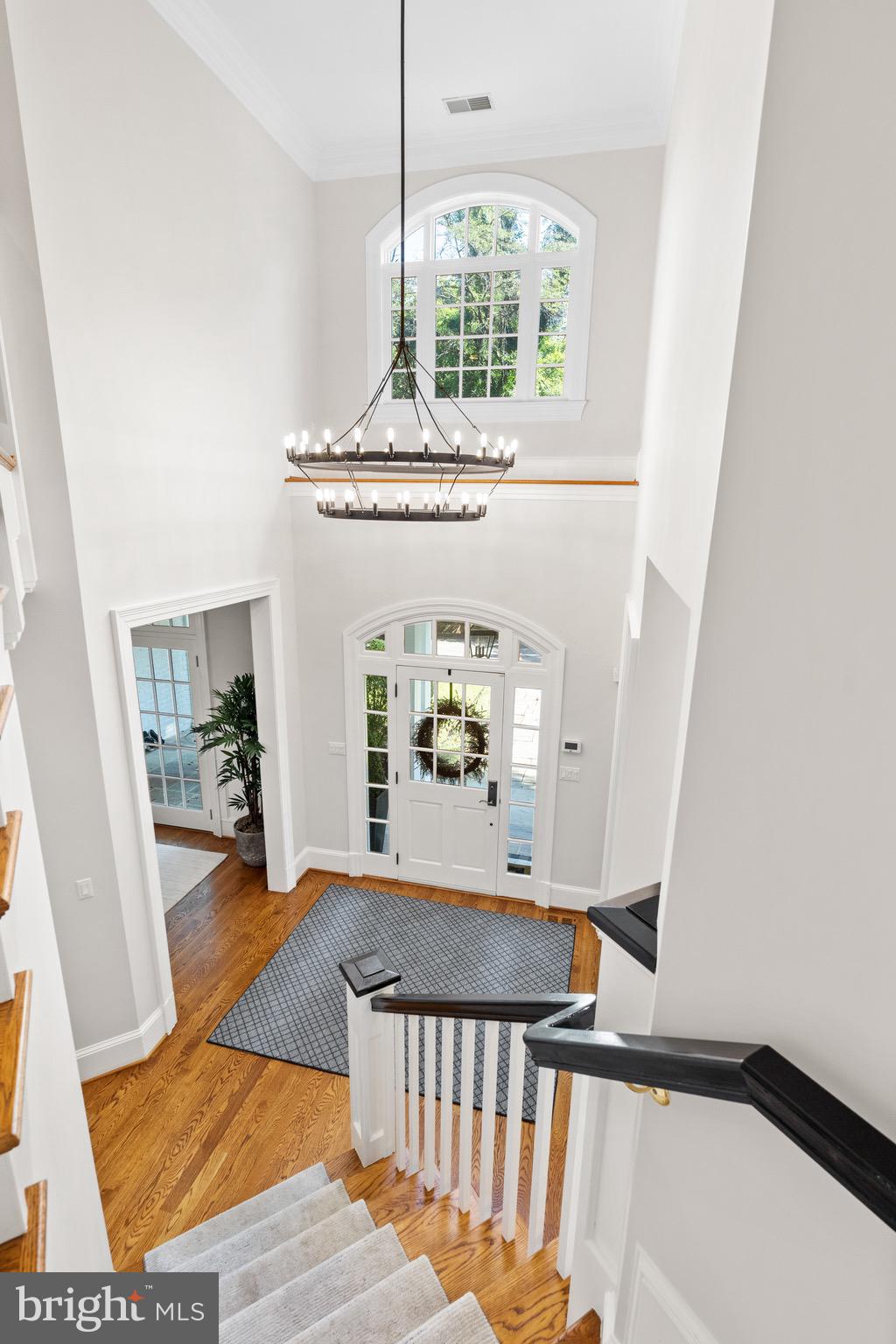 7500 Nevis Road Bethesda, MD 20817 - Photo 22 of 50 Restoration Hardware chandelier adorning foyer