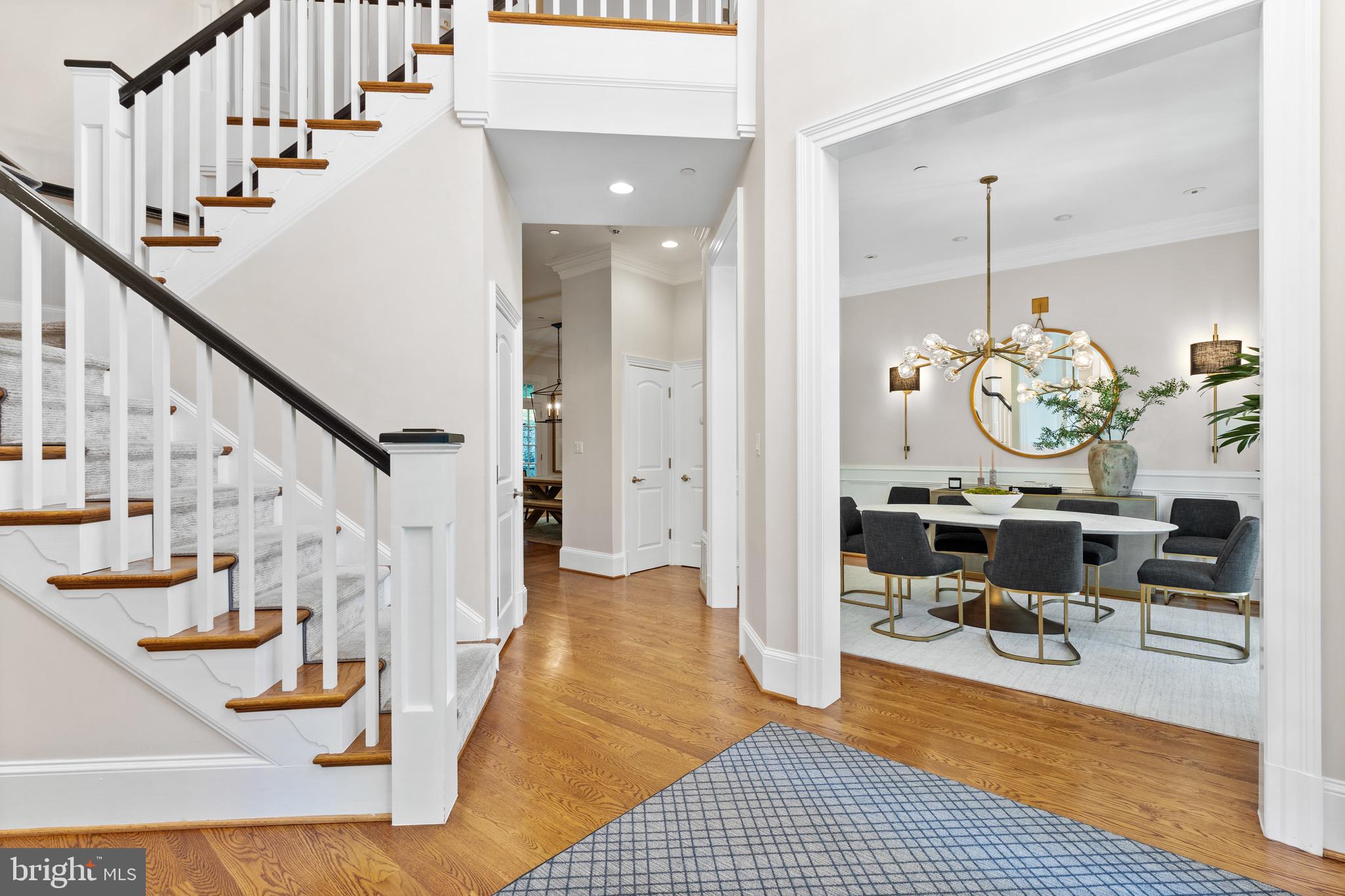 7500 Nevis Road Bethesda, MD 20817 - Photo 4 of 50 Grand foyer with double-height ceiling and stairs