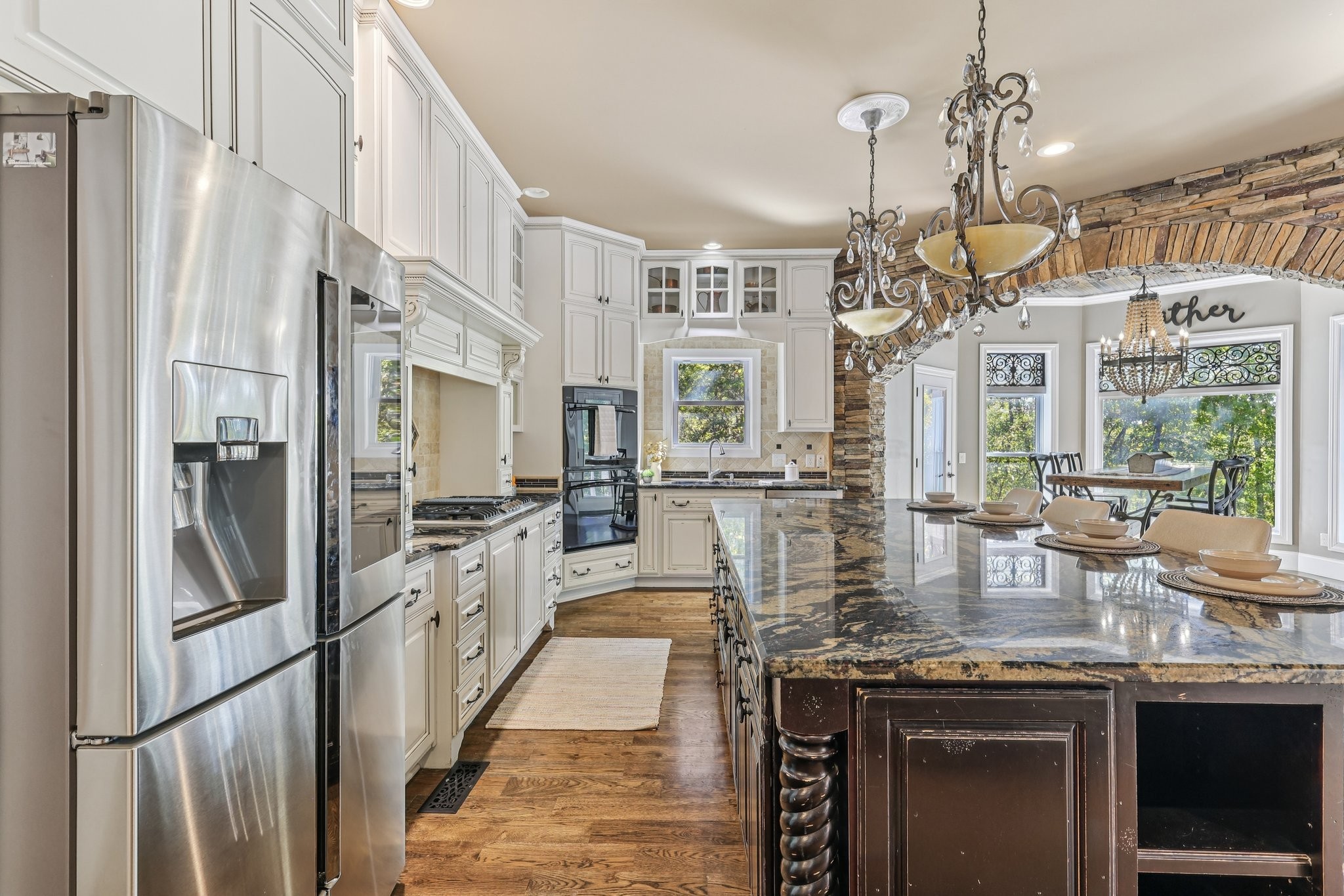 1556 A Berea Church Road Lebanon, TN 37087 - Photo 21 of 66 a kitchen with stainless steel appliances granite countertop a sink refrigerator and cabinets