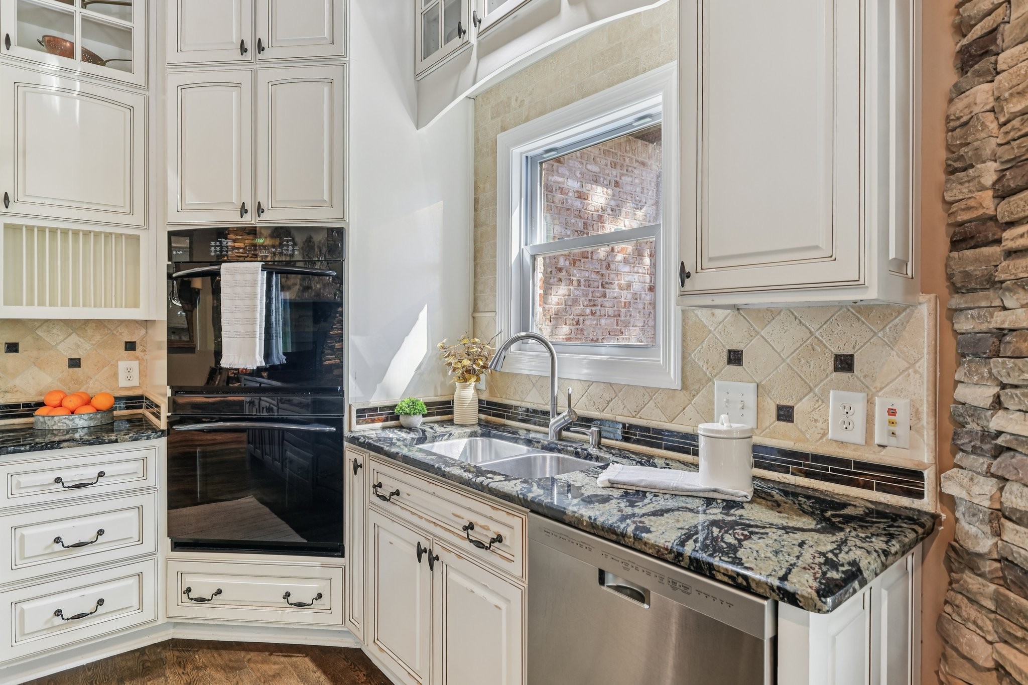 1556 A Berea Church Road Lebanon, TN 37087 - Photo 22 of 66 a kitchen with stainless steel appliances granite countertop a stove and a refrigerator