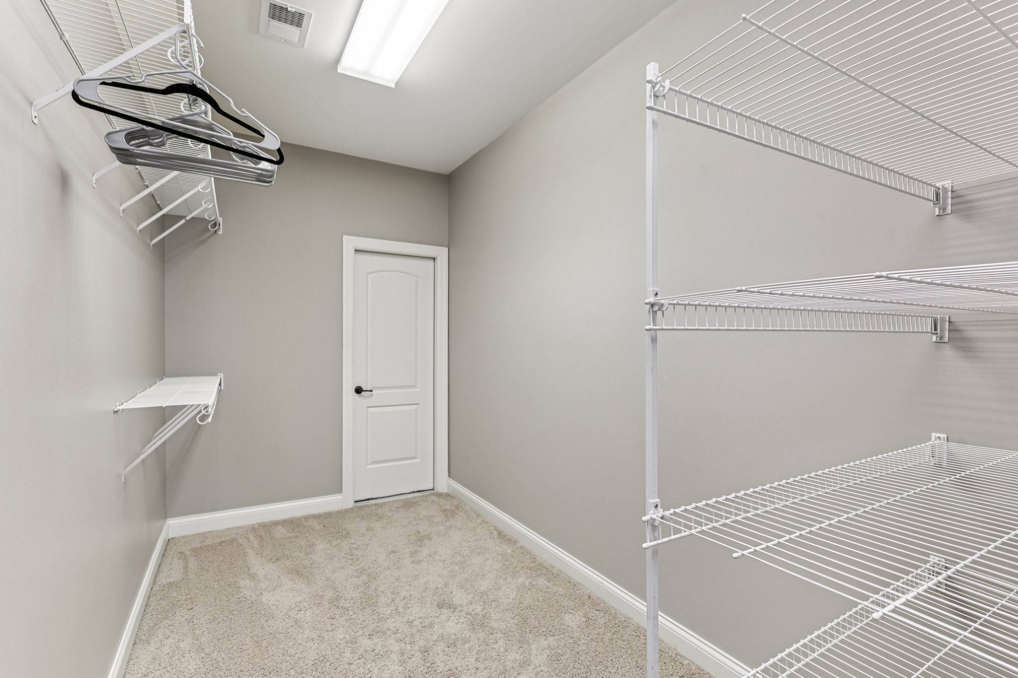 1556 A Berea Church Road Lebanon, TN 37087 - Photo 41 of 66 a view of a room with racks on the wall