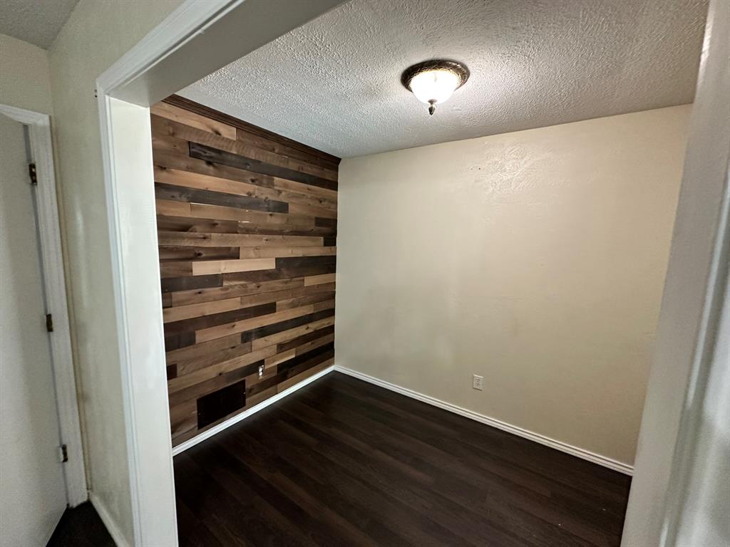502 Spring Willow Drive Allen, TX 75002 - Photo 26 of 28 a view of a room with a wooden floor
