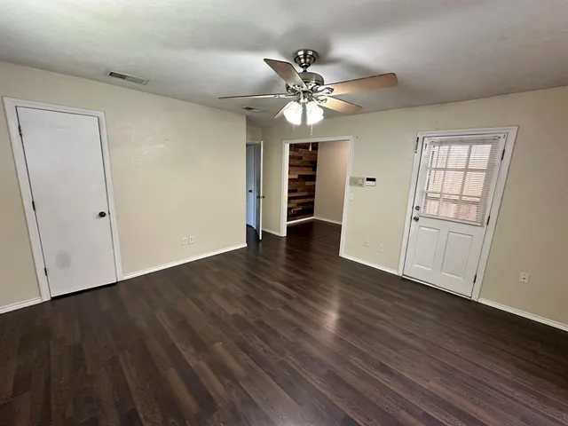 a view of bathroom with a sink and mirror