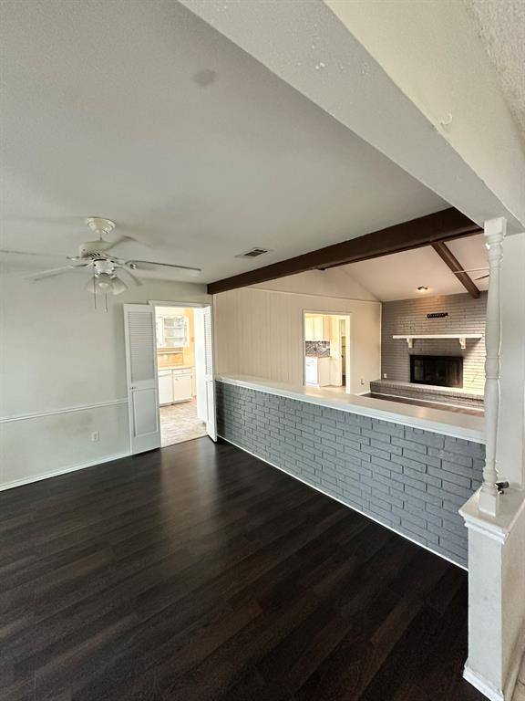 502 Spring Willow Drive Allen, TX 75002 - Photo 7 of 28 a view of an empty room with a window and wooden floor