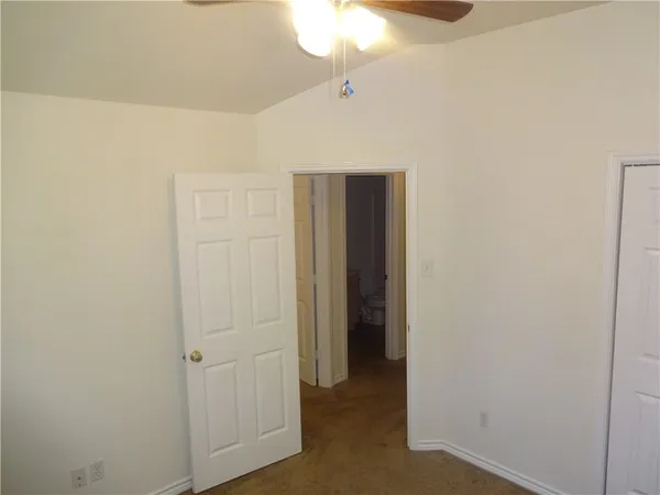 a view of a room with a window