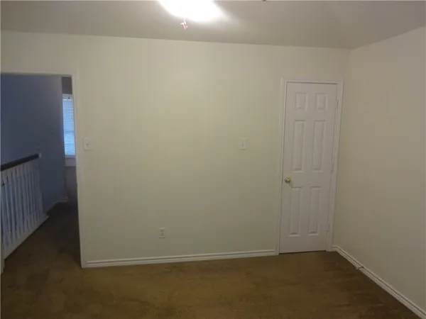 a view of a room with windows