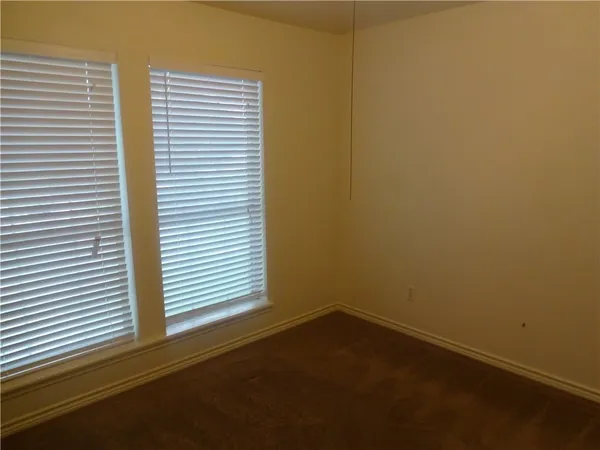 a view of a room with an empty space