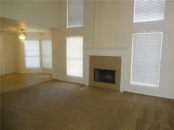 a view of a room that has a window in it