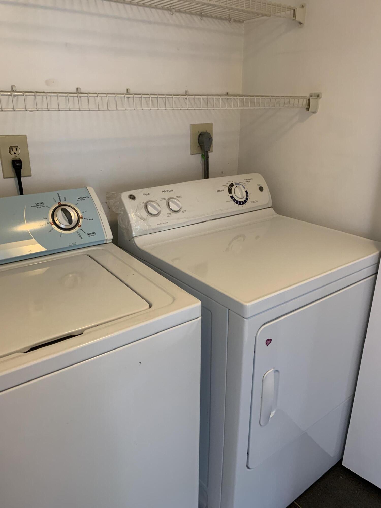 6315 La Costa Drive, Unit E Boca Raton, FL 33433 - Photo 18 of 22 a utility room with dryer and washer