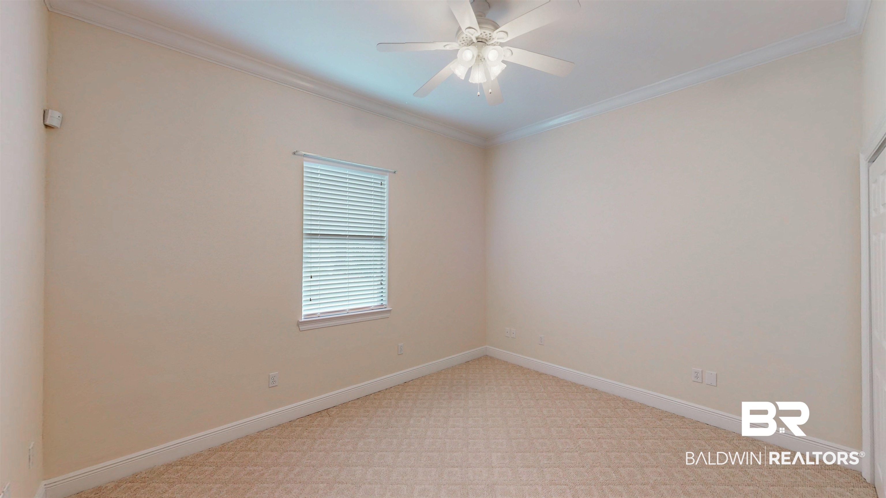 214 Hemingway Loop Foley, AL 36535 - Photo 20 of 67 Unfurnished room with ornamental molding, ceiling fan, and light carpet
