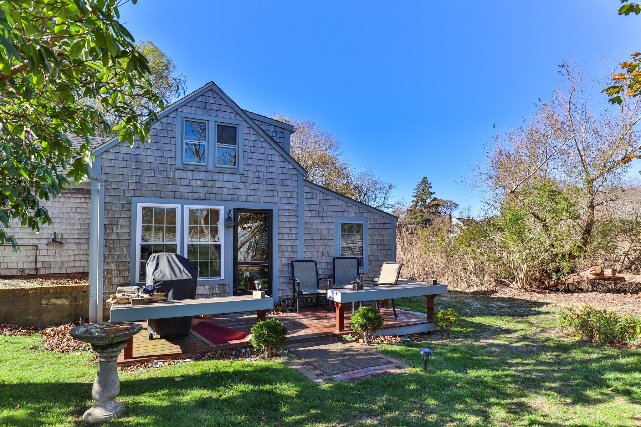 400 Lower County Road Harwich Port, MA 02646 - Photo 34 of 49 a view of house with backyard