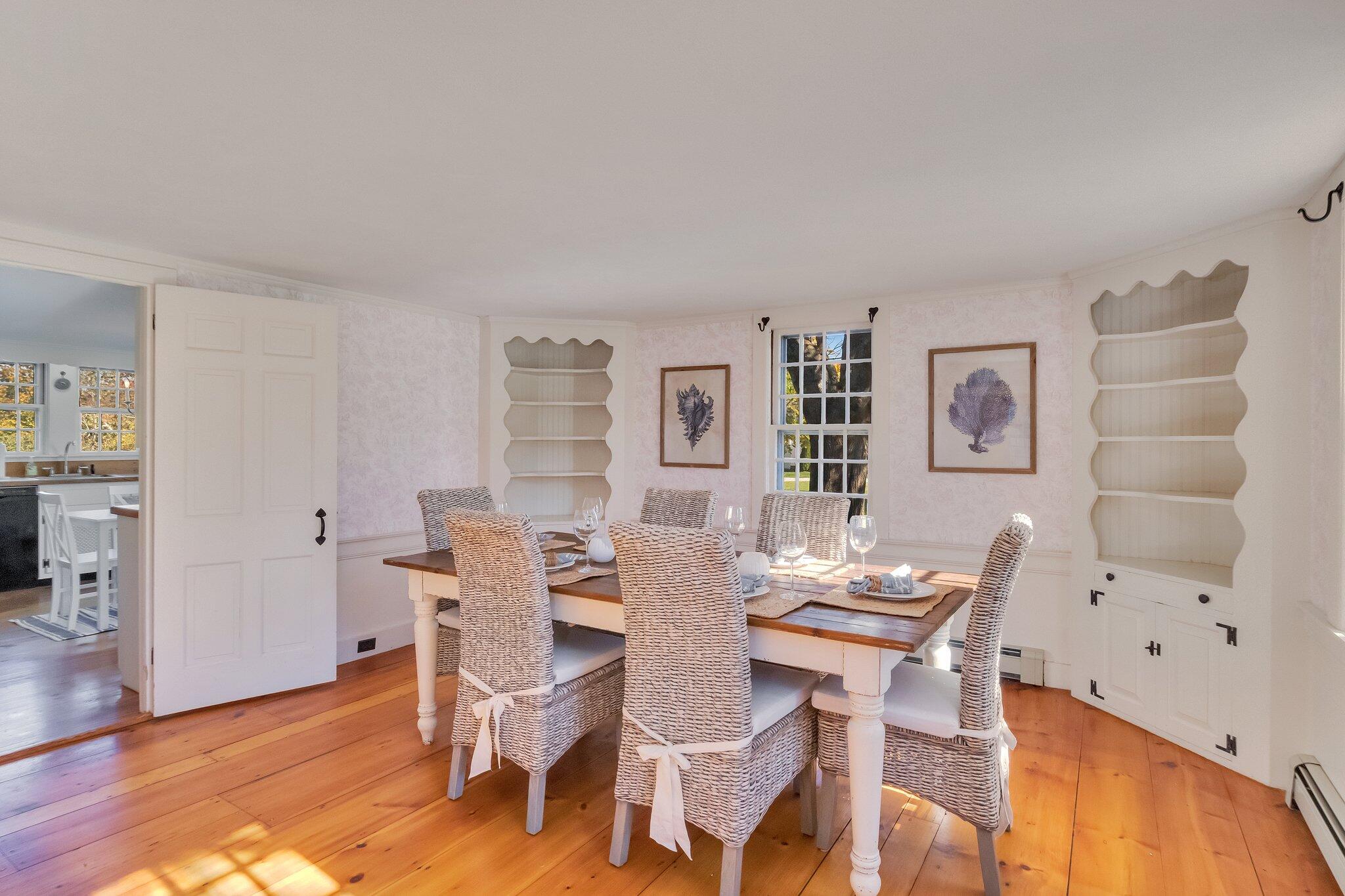 400 Lower County Road Harwich Port, MA 02646 - Photo 10 of 49 a view of a dining room with furniture and wooden floor