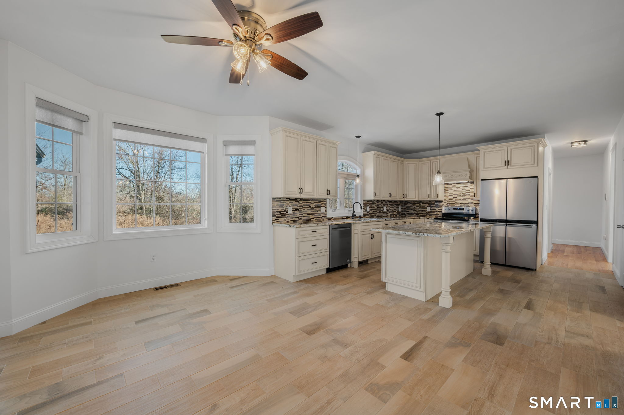 2 Syleo Lane Salem, CT 06420 - Photo 18 of 40 Eat-in kitchen and island provides the option for additional seating in addition to the dining room
