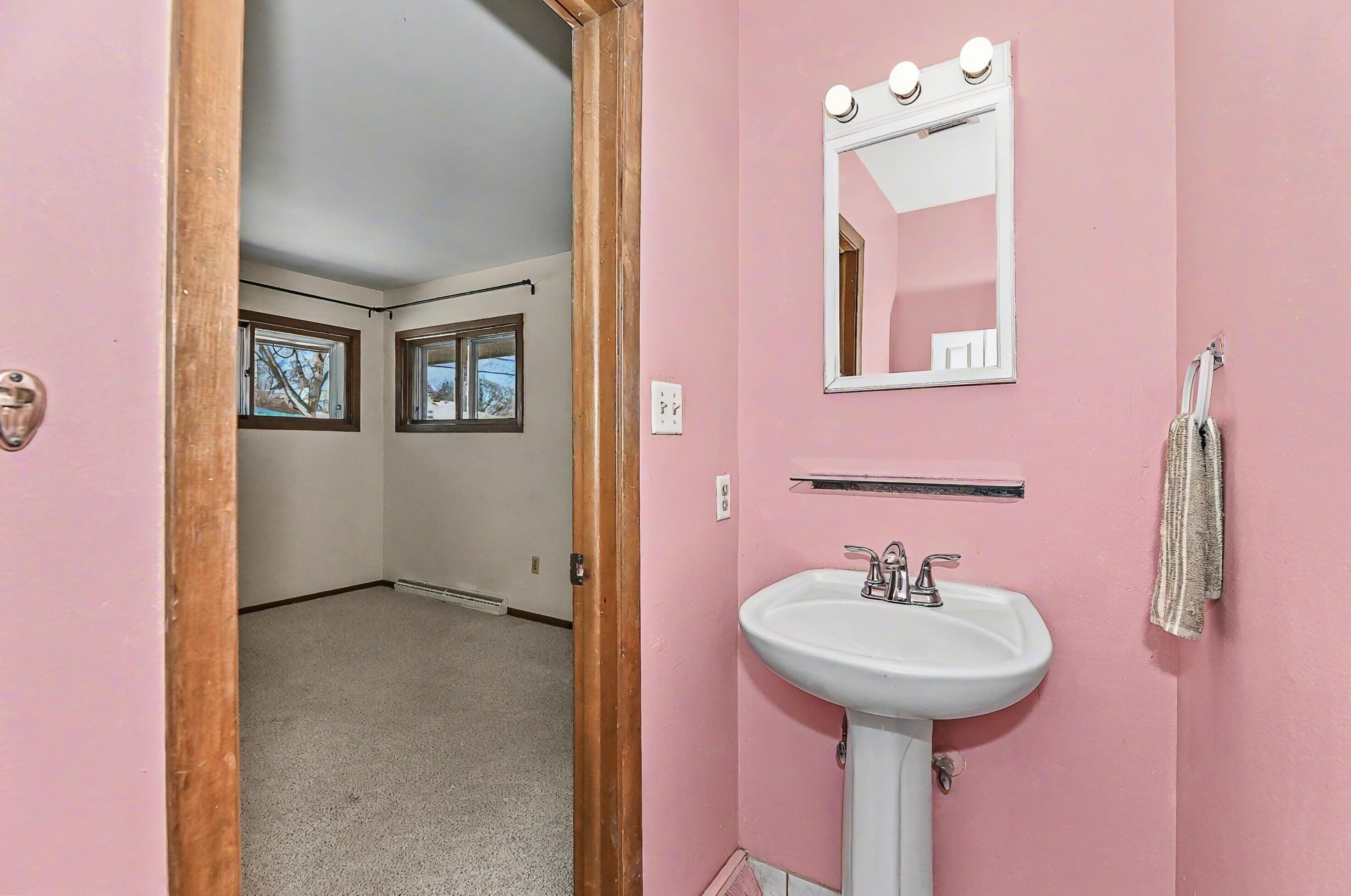 3769 South 84th Street Milwaukee, WI 53228 - Photo 17 of 37 Half Bath off Primary Bedroom