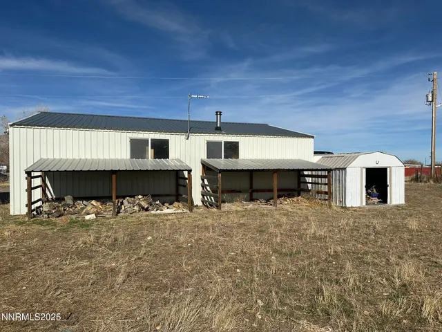 a front view of a house with large window