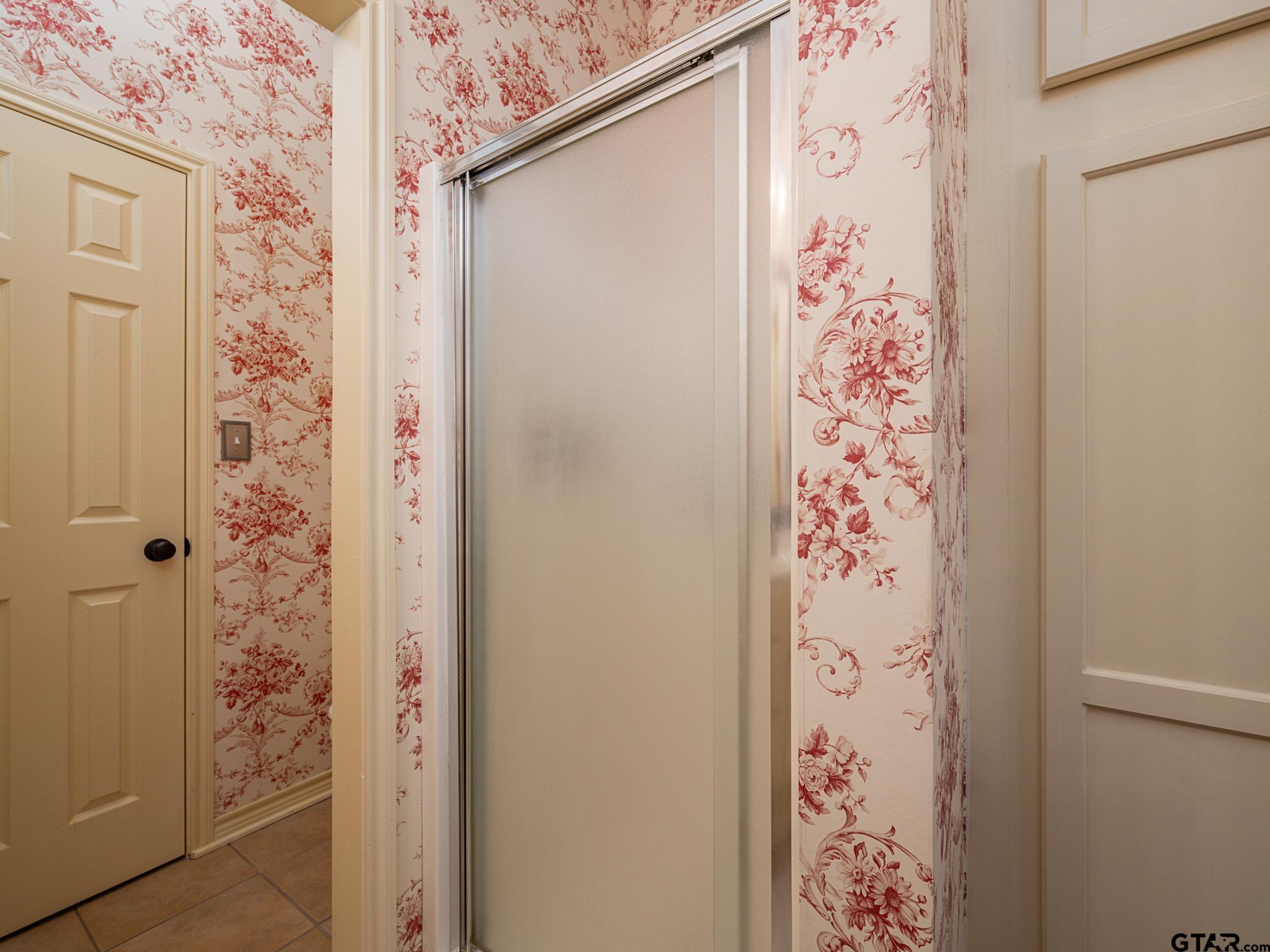 11201 Skyline Drive Brownsboro, TX 75756 - Photo 29 of 39 a bathroom with a shower curtain