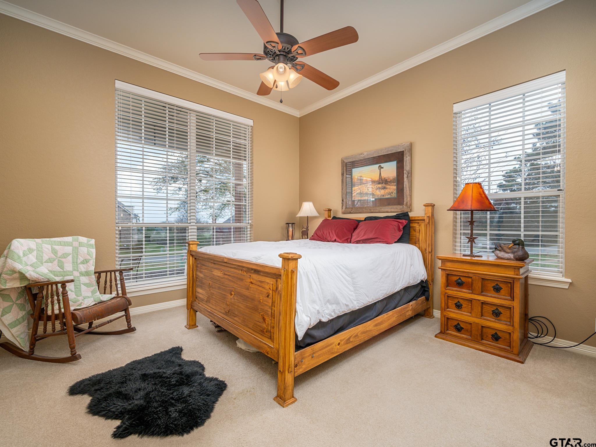 11201 Skyline Drive Brownsboro, TX 75756 - Photo 34 of 39 a bedroom with a bed dresser and a window