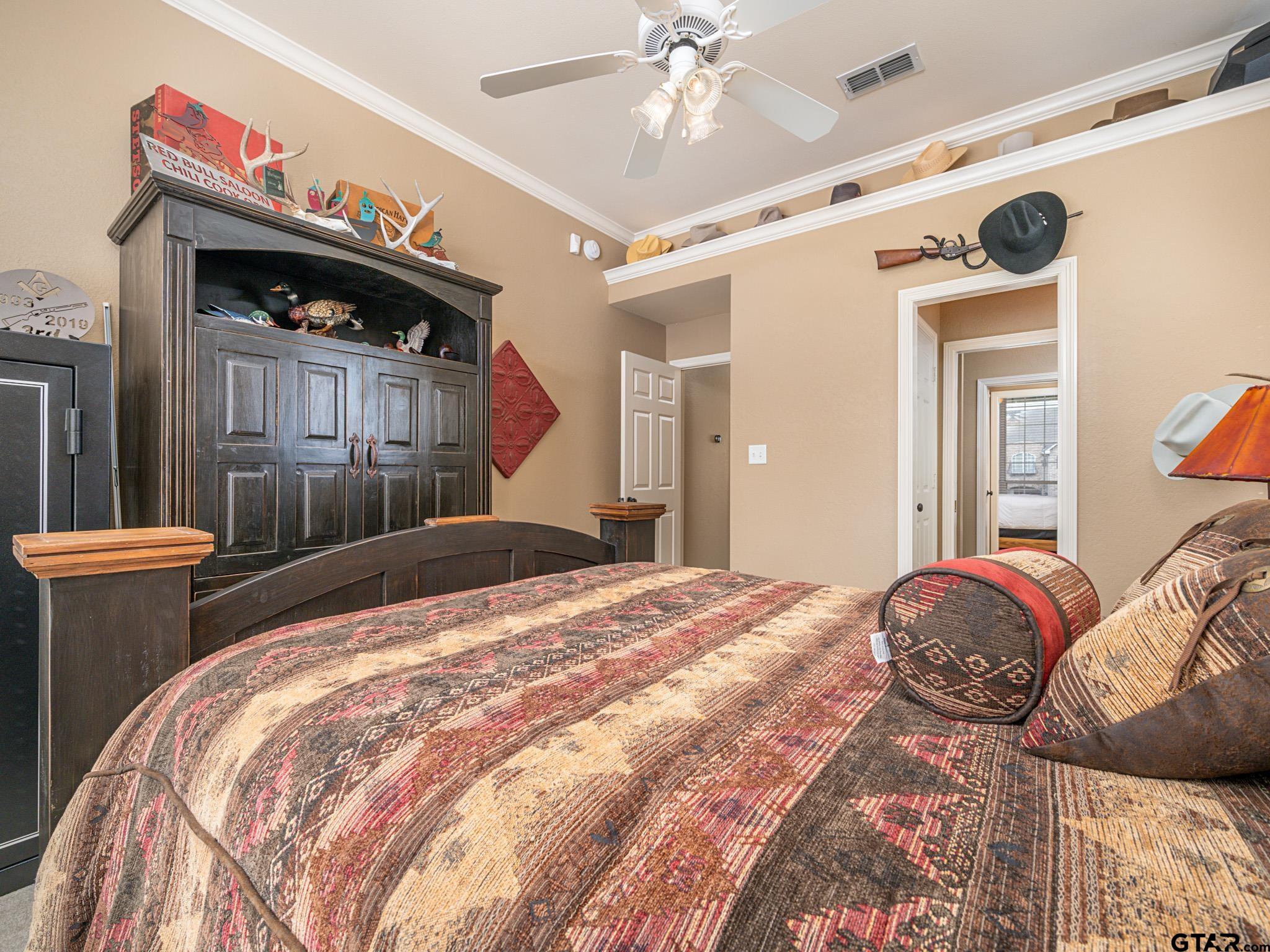 11201 Skyline Drive Brownsboro, TX 75756 - Photo 39 of 39 a bed sitting in a bedroom next to a window