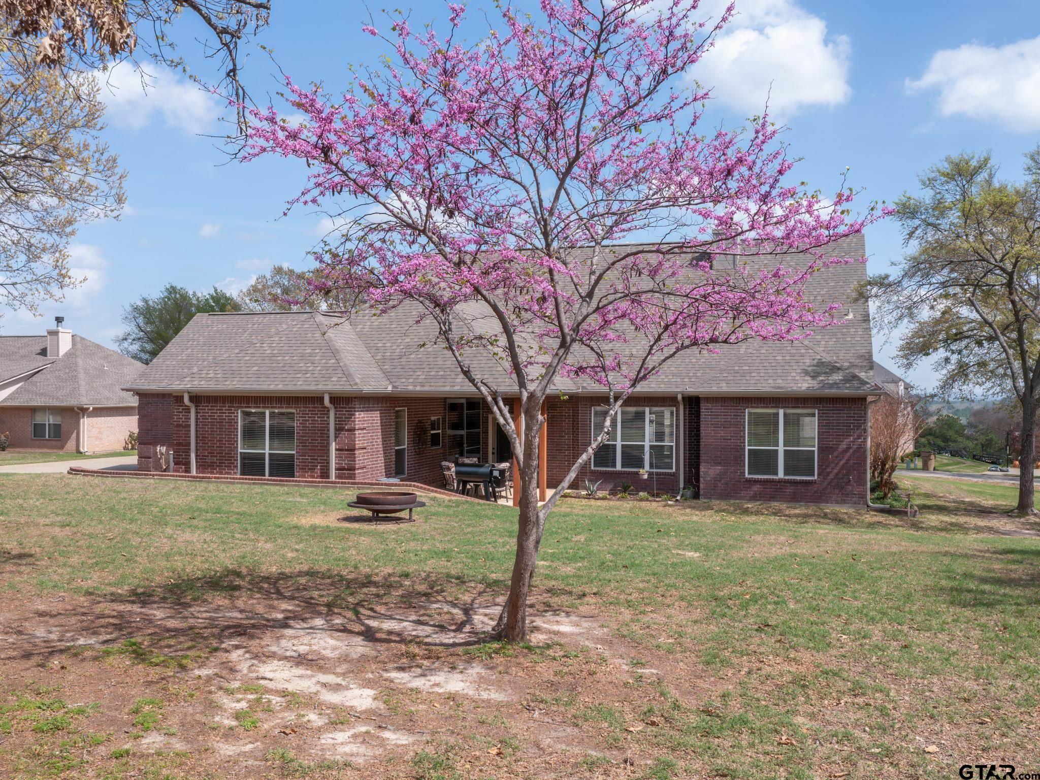 11201 Skyline Drive Brownsboro, TX 75756 - Photo 7 of 39 a front view of a house with garden