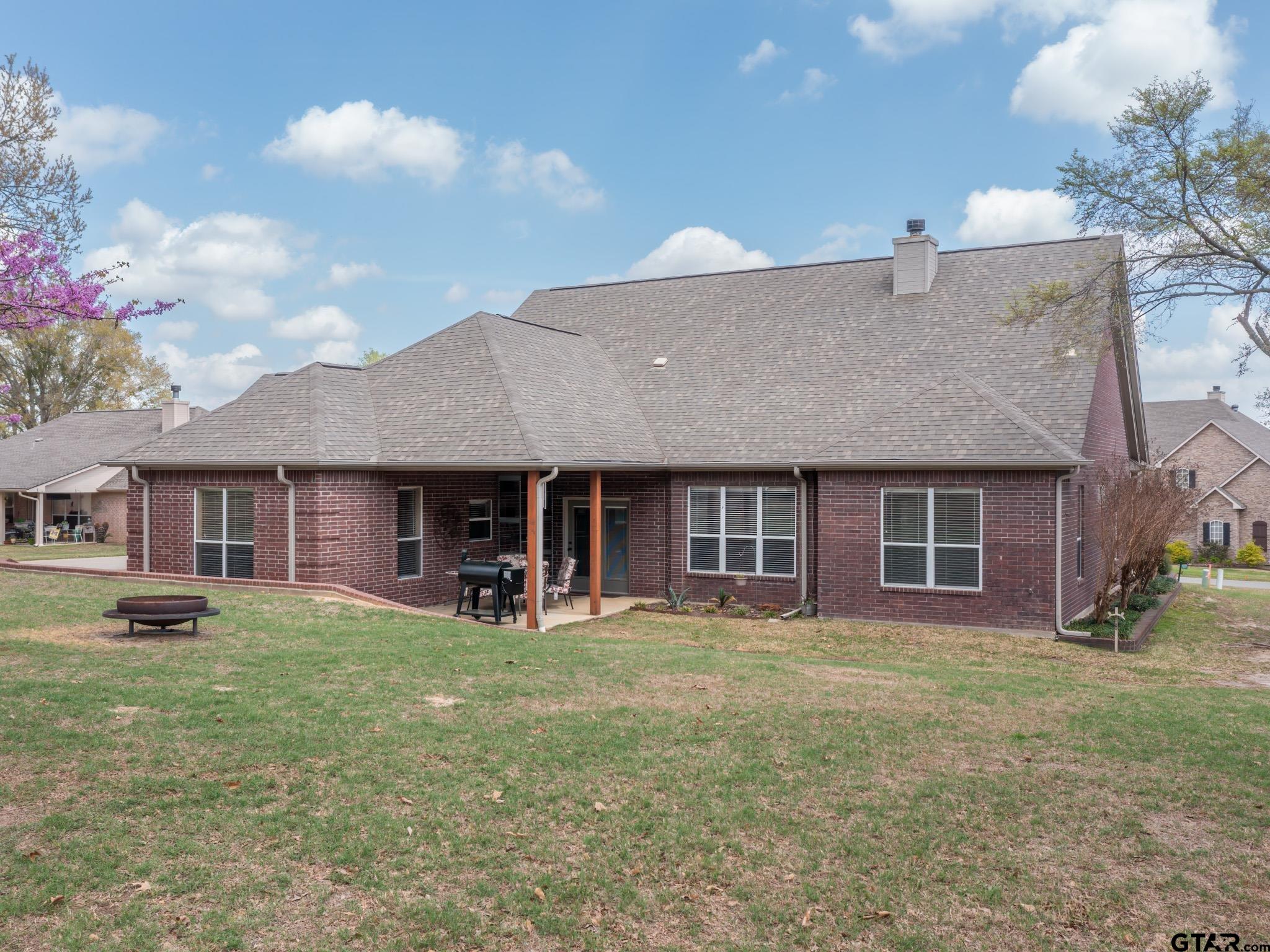 11201 Skyline Drive Brownsboro, TX 75756 - Photo 8 of 39 a front view of a house with a yard