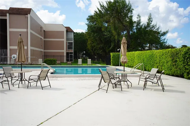 a view of outdoor space yard and swimming pool