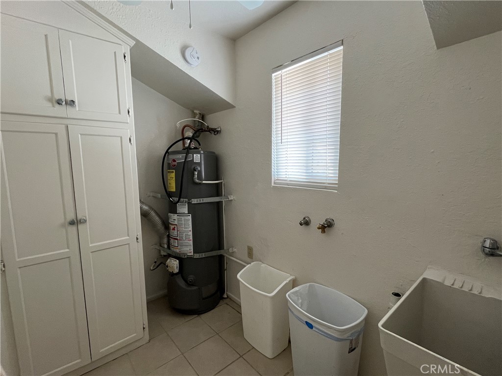 12014 Oasis Road Pinon Hills, CA 92372 - Photo 15 of 16 a bathroom with a toilet and a shower
