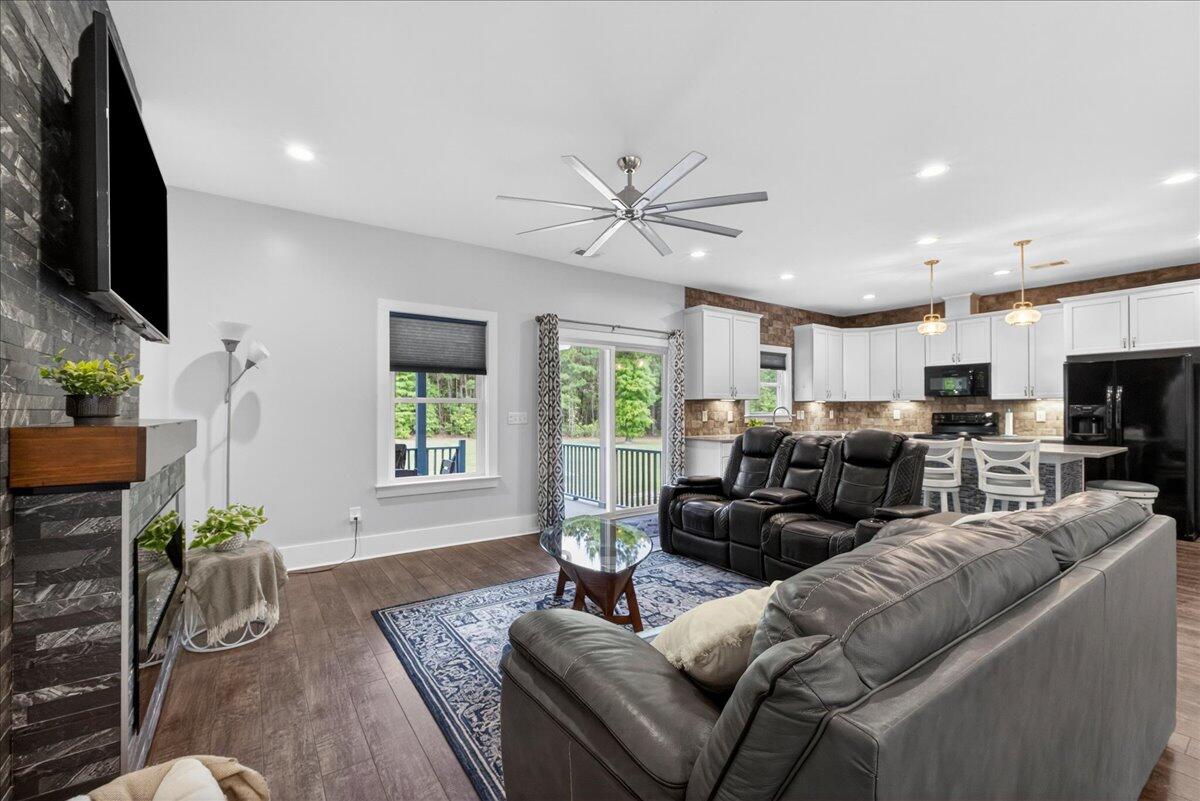 1448 Longridge Road Moncks Corner, SC 29461 - Photo 3 of 32 Living room and kitchen view