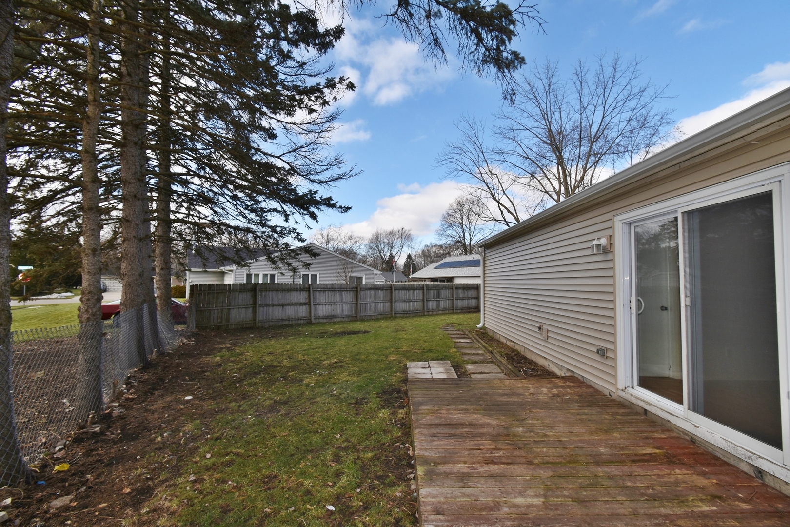 103 Tealwood Road Montgomery, IL 60538 - Photo 23 of 23 a view of a backyard with large trees