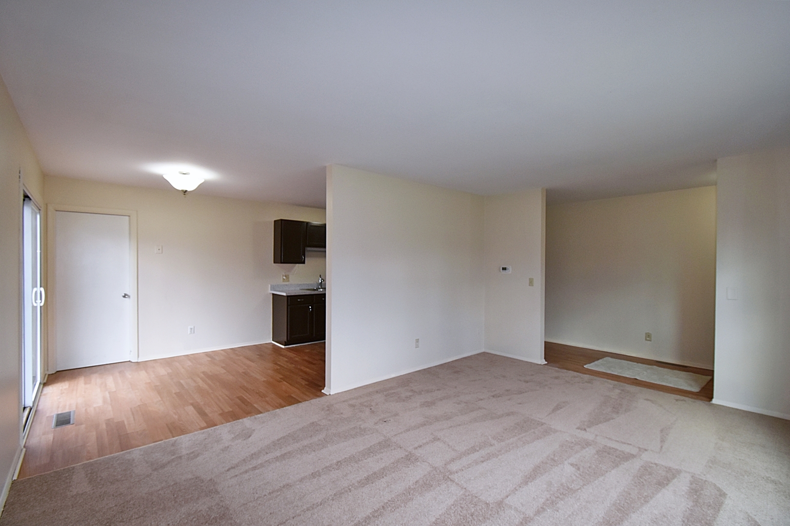 103 Tealwood Road Montgomery, IL 60538 - Photo 5 of 23 a view of a livingroom with wooden floor
