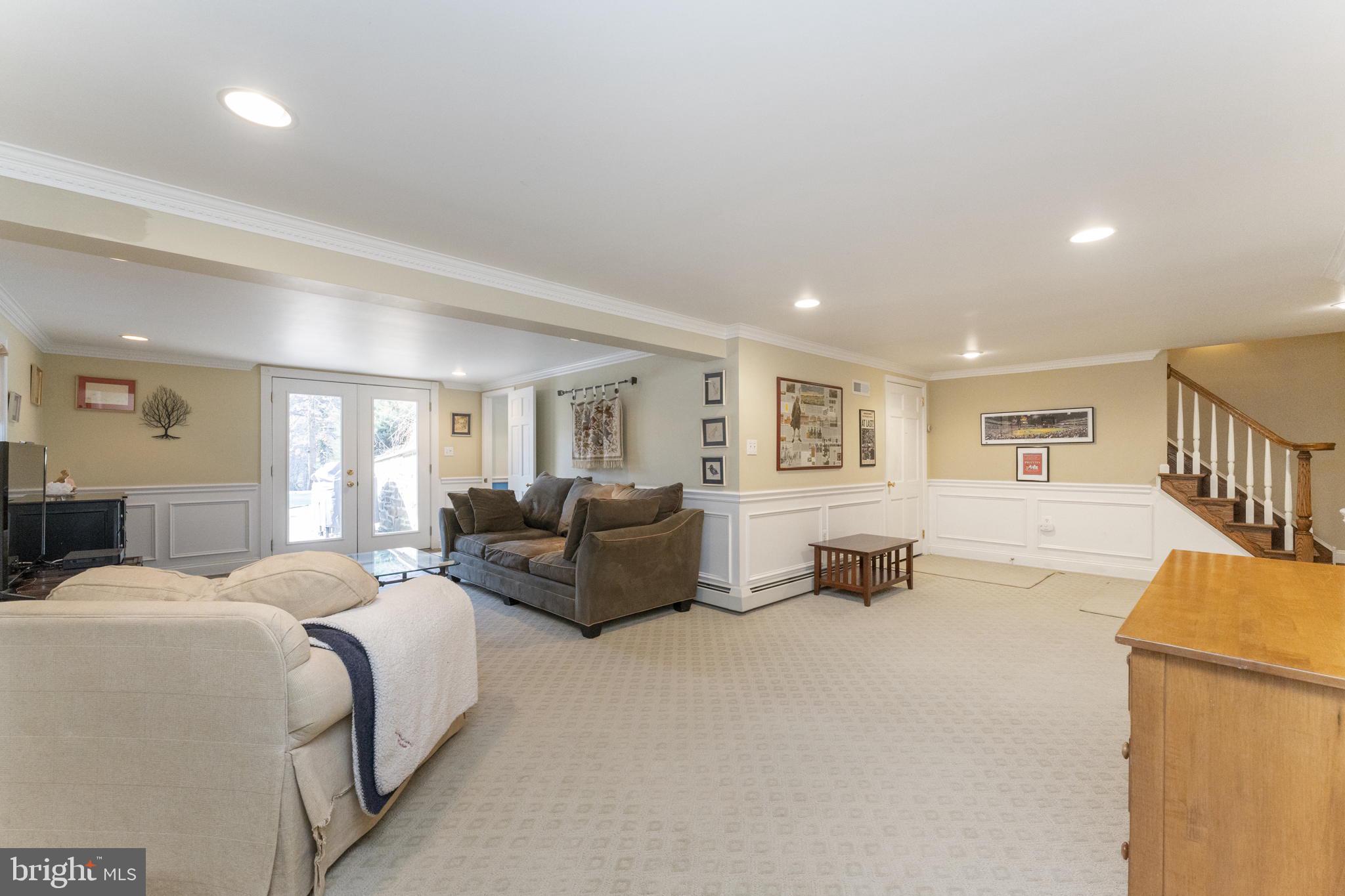 1414 Kyneton Road Villanova, PA 19085 - Photo 42 of 56 Lower Level w/ French Door to outside patio & Pool