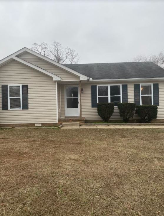 1331 Hugh Hunter Road Oak Grove, KY 42262 - Photo 1 of 1 front view of a house with a yard
