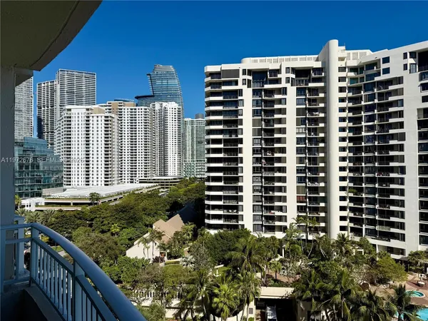 a front view of a building with glass windows