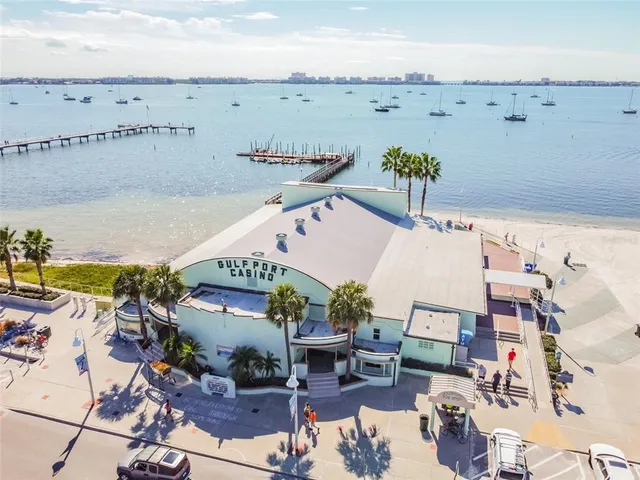 an aerial view of a house with outdoor space