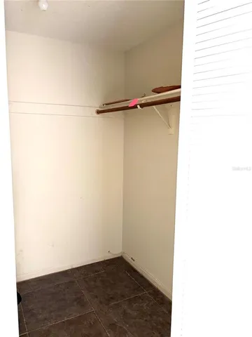 a view of small space with racks on the wall