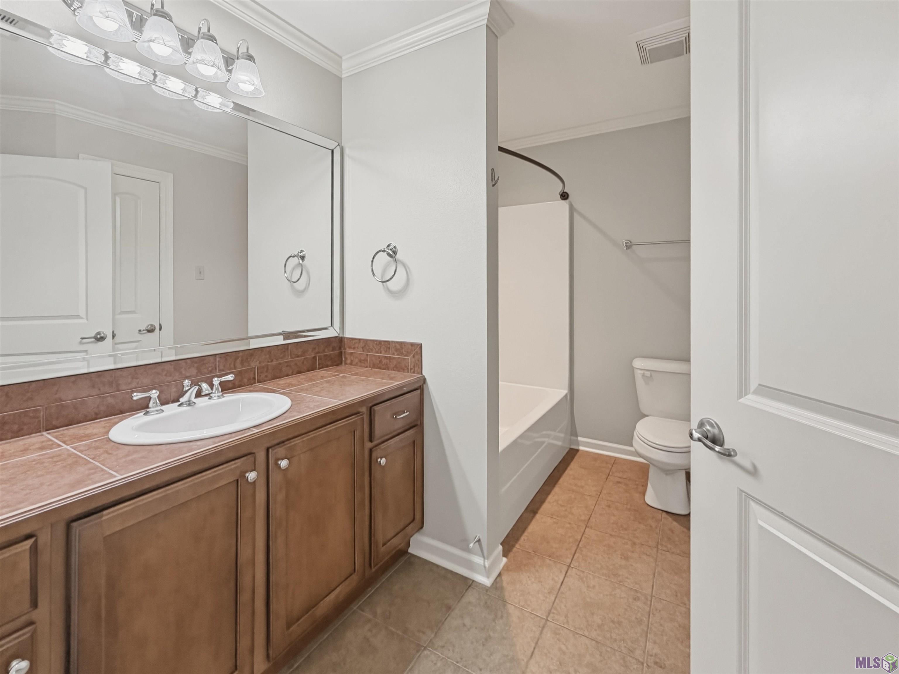 7111 Village Charmant Drive, Unit 94 Baton Rouge, LA 70809 - Photo 11 of 12