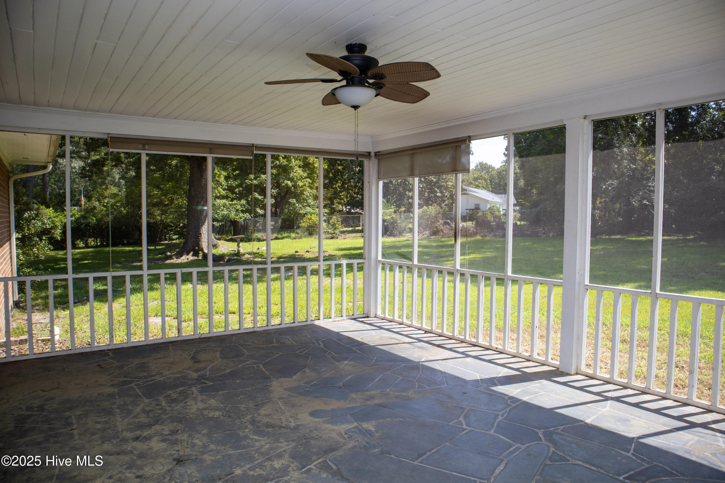 119 Watson Street Enfield, NC 27823 - Photo 31 of 38 Screened porch