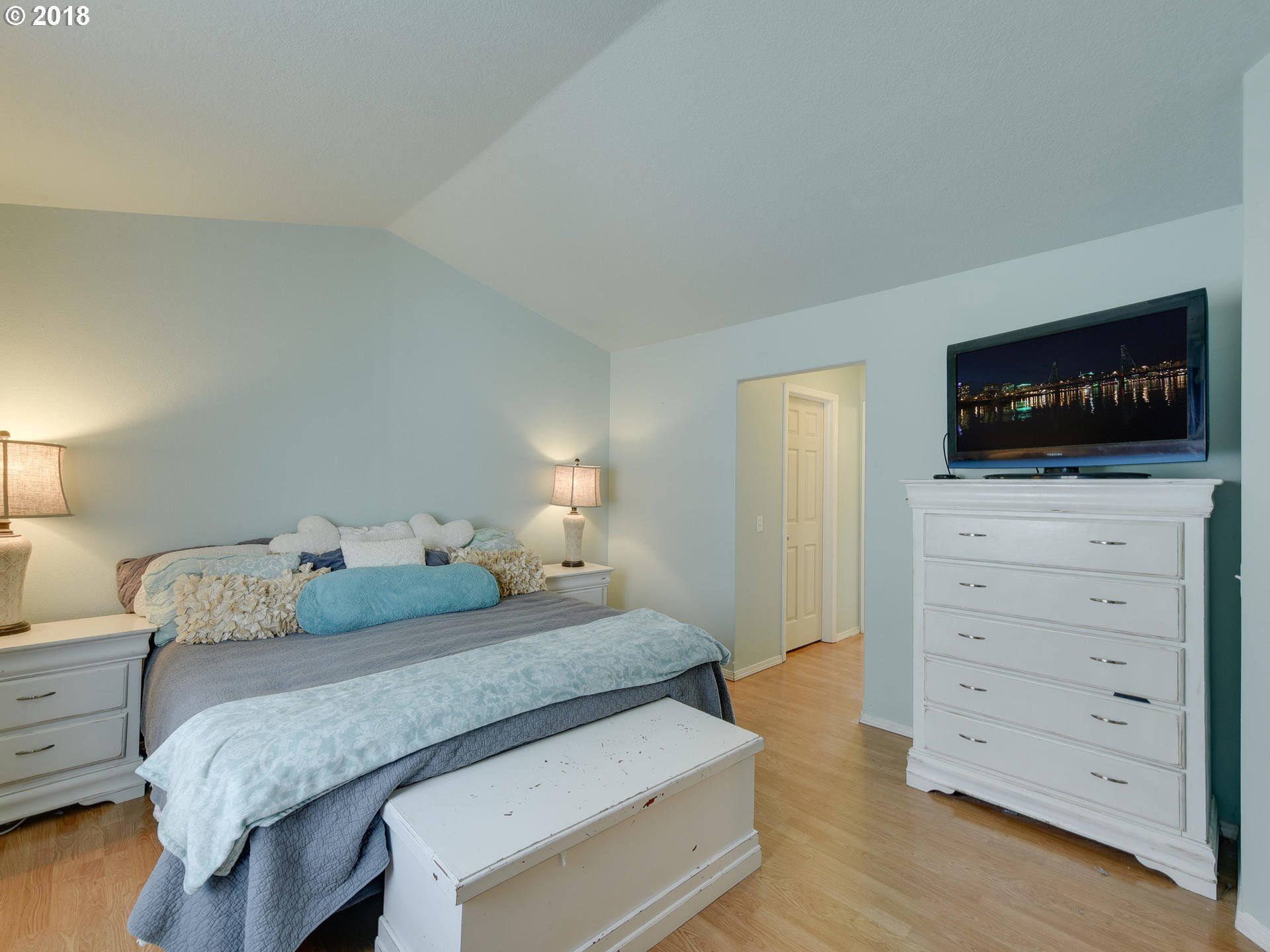 34484 Vail Court St. Helens, OR 97051 - Photo 11 of 16 a bedroom with a bed and a flat screen tv