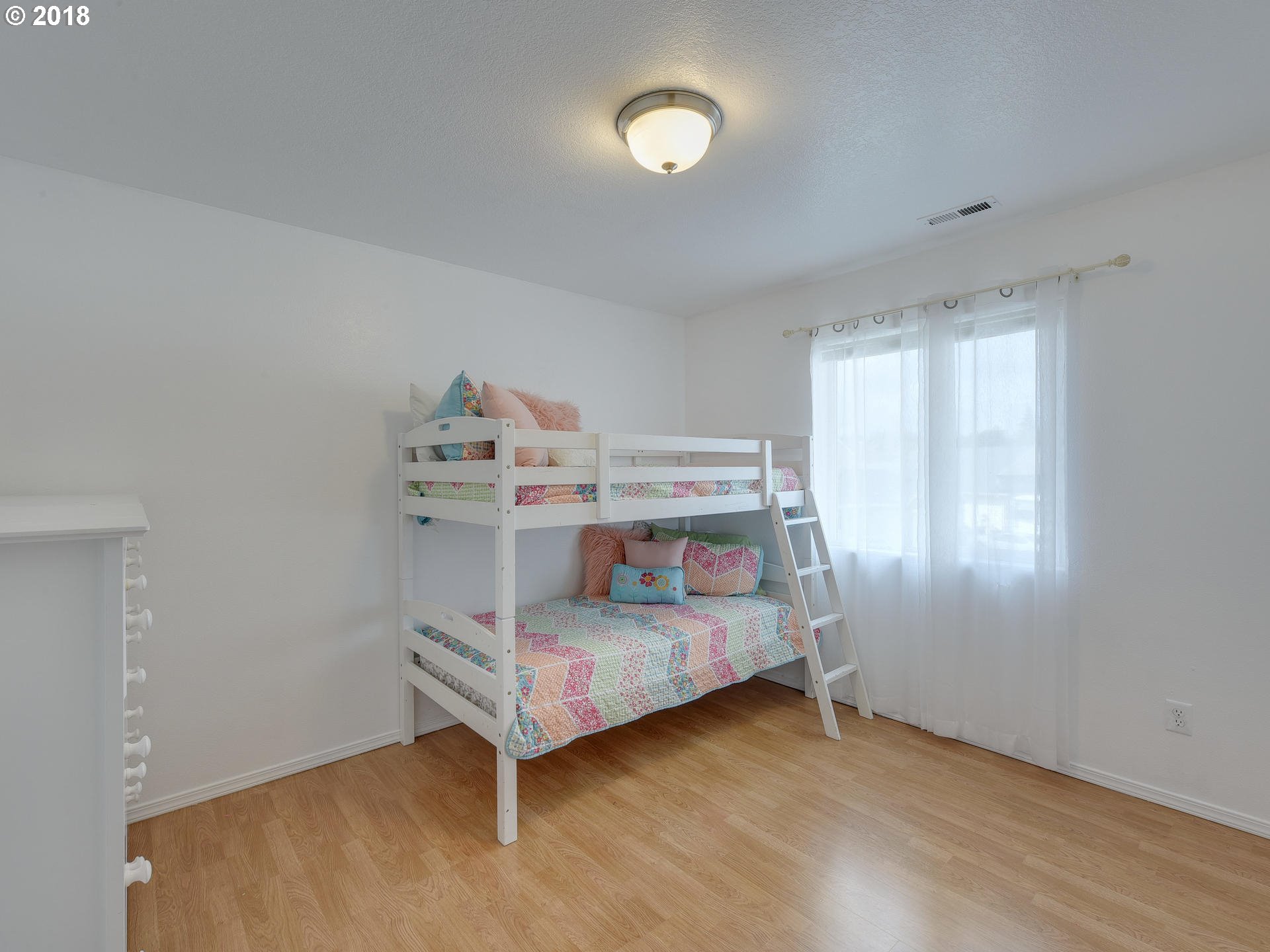 34484 Vail Court St. Helens, OR 97051 - Photo 13 of 16 a room with a bed and a window