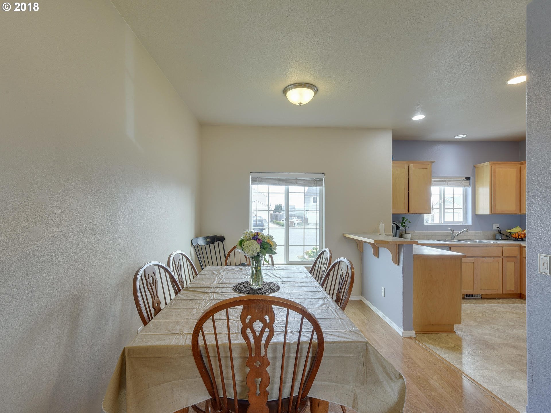 34484 Vail Court St. Helens, OR 97051 - Photo 8 of 16 a very nice looking dining room with furniture window and wooden floor