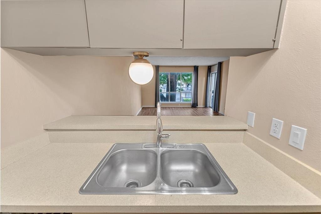 4859 Cedar Springs Road, Unit 241 Dallas, TX 75219 - Photo 12 of 38 a close view of sink and tap