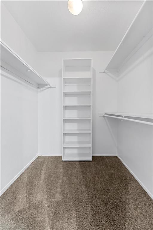 4859 Cedar Springs Road, Unit 241 Dallas, TX 75219 - Photo 20 of 38 a view of walk in closet with empty racks